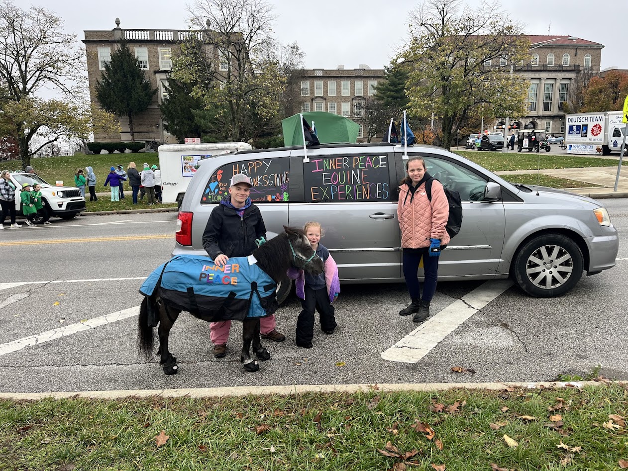 Sir Camelot and the Inner Peace team participating in a community parade